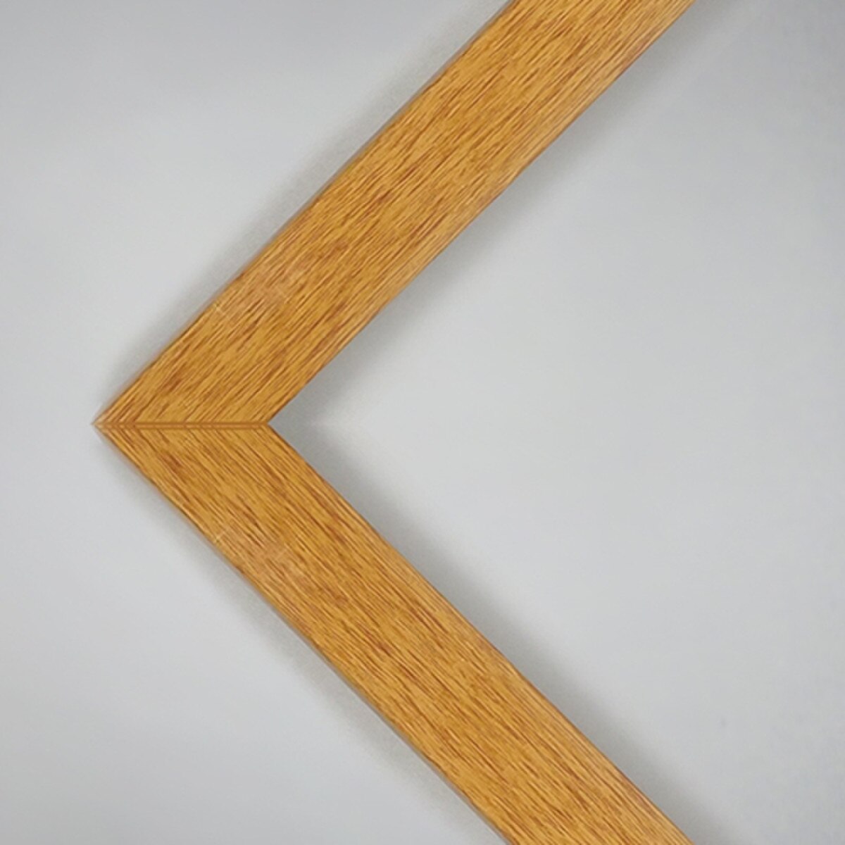 Frame honey pecan laminate finish.